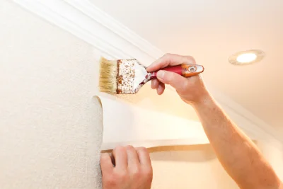 Pose de papier peint à Oudon — revêtements muraux et toiles de verre